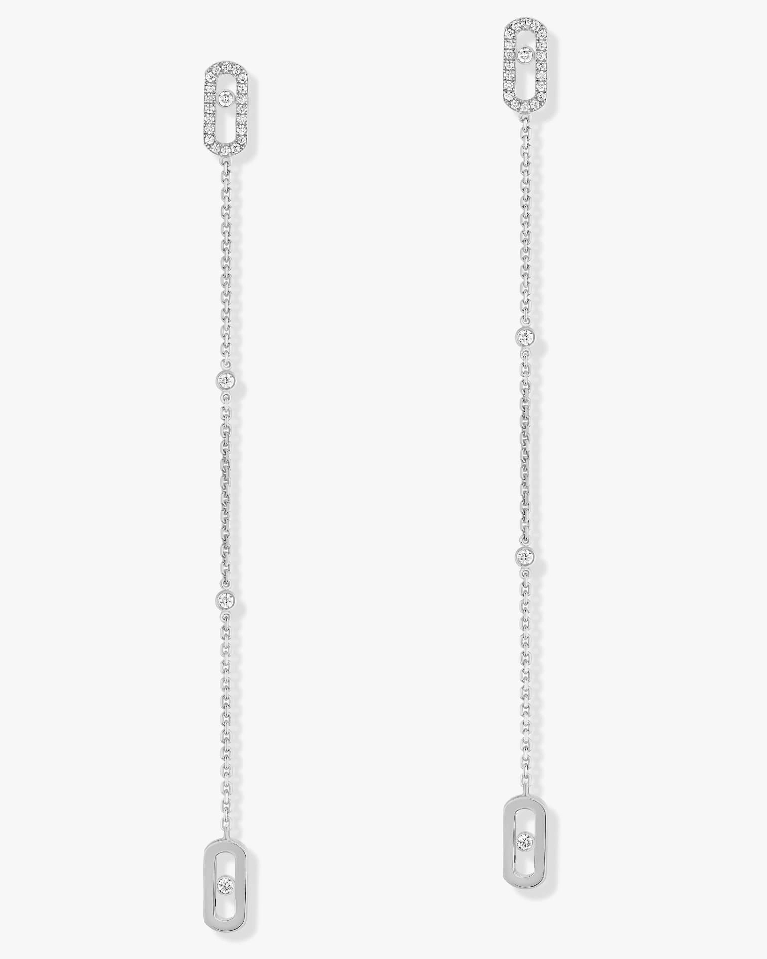 Pendientes de boda Move Uno de Valérie Messika en oro y diamantes, con diseño de pavé en el lóbulo y cadenas de oro, realzados por el icónico diamante móvil de la Maison Messika.